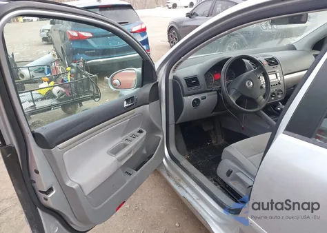 2009 Volkswagen Rabbit S z USA, uszkodzony, nr VIN WVWDB71K79W085434